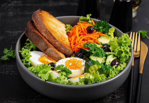 Balanced Healthy Meal with Greens, Cucumbers and Eggs