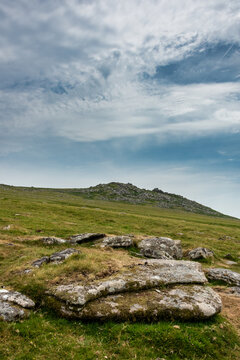 Lovely Summer day landscape image of Rough Tor on Bodmin Moor in English countryside