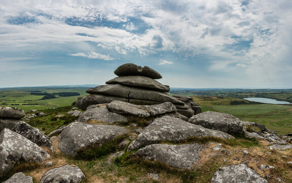 Lovely Summer day landscape image of Rough Tor on Bodmin Moor in English countryside