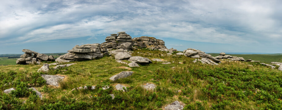 Lovely Summer day landscape image of Rough Tor on Bodmin Moor in English countryside