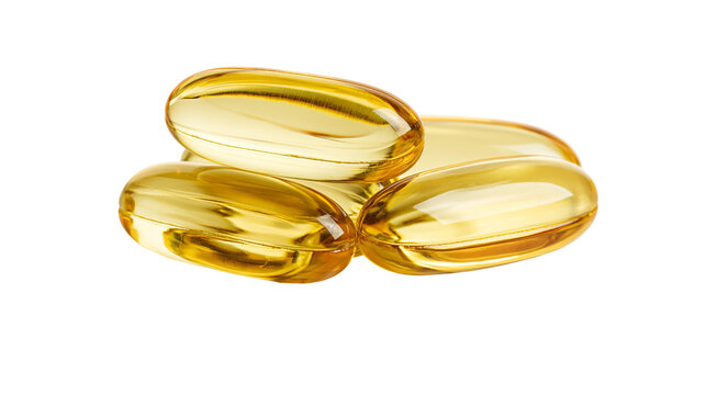 Pile of translucent golden oval softgel capsules