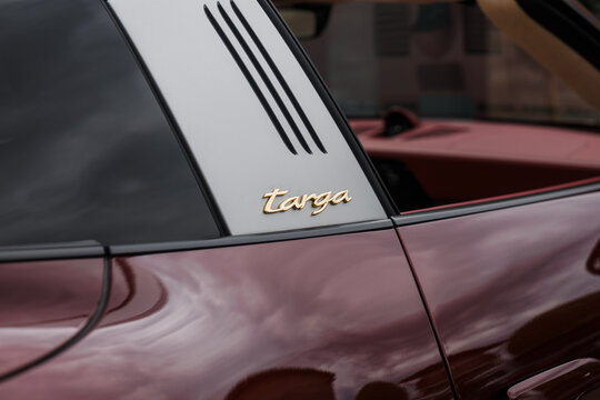 Ljubljana, Slovenia - 2 June 2026: A close view of the Porsche 911 Targa 4S displaying its unique Targa badge and sleek design at a car show setting.
