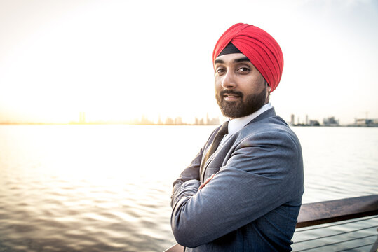 Punjab businessman wearing traditional indian head scarf and formal corporate business suit