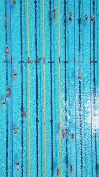 Aerial Top Down View of Swimmers Training in an Outdoor Swimming Pool