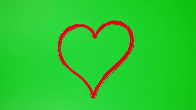 Hand drawn red heart pulsing gently on green screen background with cinematic motion and soft focus