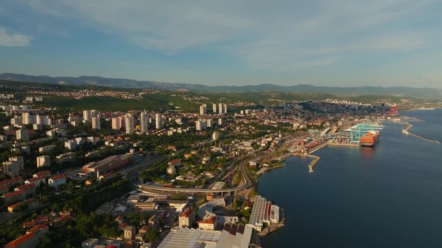 Scenic drone view of Rijeka Old Town and harbor under bright sunlight