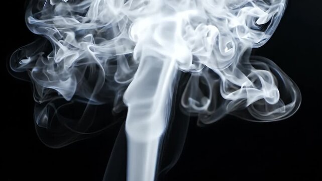 Graceful White Smoke Plume on Black Background - A delicate plume of white smoke gracefully ascends against a deep black background.