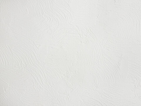 Plaster-like white paper holds broad scraped bands beside shallow cracks and compressed grooves, offering a high-relief background for mixed media layering, textured typography and tonal studies