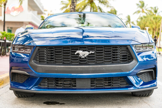 Miami, Florida, USA - July 27, 2025: Ford Mustang 2024 convertible car. Luxury convertible car Ford Mustang. Car Ford Mustang parked outdoor. Blue convertible car, front view