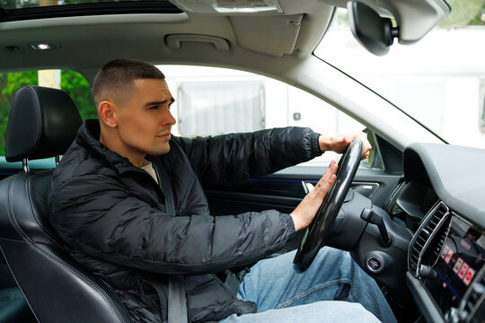 Man, hands and horn in car for driving, hooting and pressing steering wheel for caution warning or road rage.