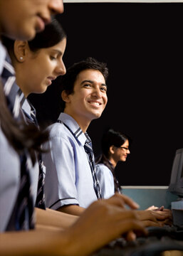 Portrait of a student in a computer lab