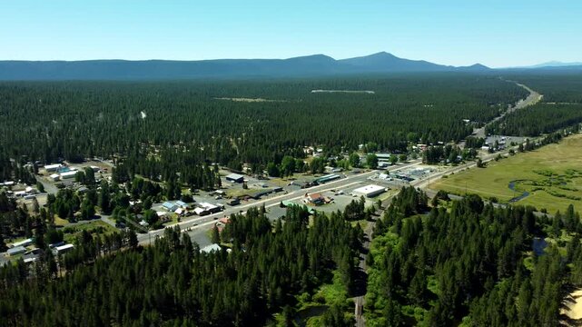 US, Oregon, Crescent, 2026-07-09 - Drone view of highway 97 and the city's dowtown area, in Summer