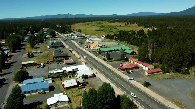 US, Oregon, Crescent, 2026-07-09 - Drone view of highway 97 and the city's dowtown area, in Summer