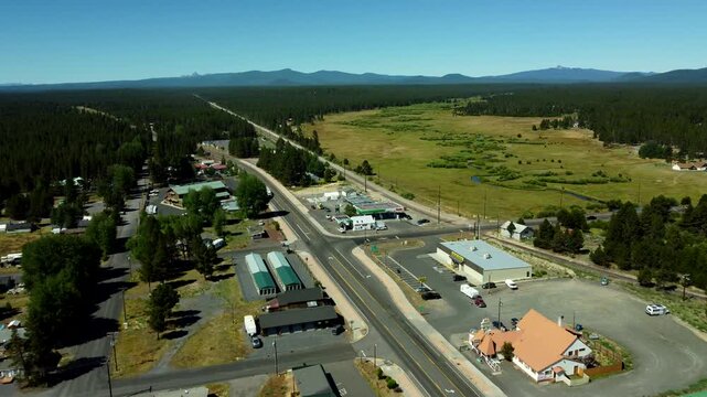 US, Oregon, Crescent, 2026-07-09 - Drone view of highway 97 and the city's dowtown area, in Summer
