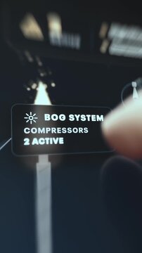 BOG System Callout Showing Two Active Compressors Beside a Flare Flame