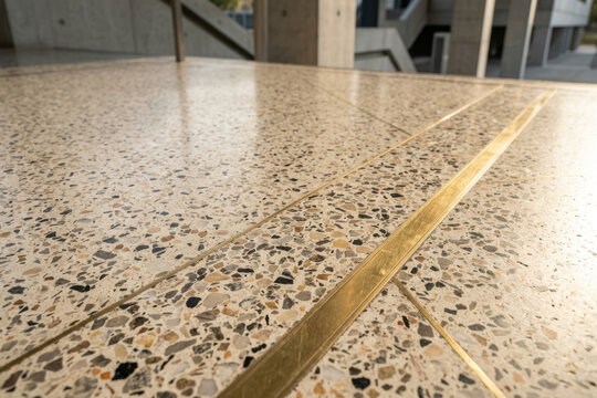 Terrazzo floor with brass inlay strips