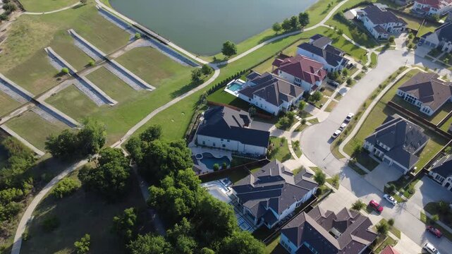Paved dead end turnarounds serve private residential properties shaded by lush community greenery in Frisco, Texas. Open park spaces integrate seamlessly into wider Dallas Fort Worth metroplex