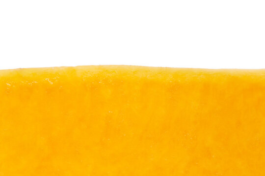 slice of orange pumpkin against white background
