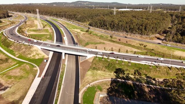 Aerial drone view of the M1 Pacific Motorway Extension project at Black Hill, Newcastle, NSW Australia on a sunny morning on 26 July 2026