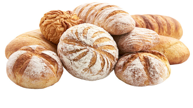Assortment of crusty artisan bread loaves dusted with flour
