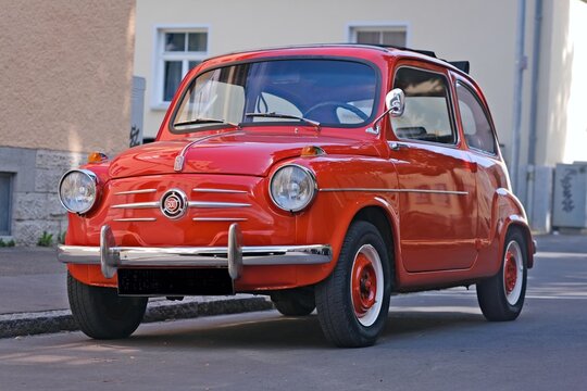 Neu-Ulm, Germany - July, 25, 2026: Vintage Italian car Fiat 600 parking at the roadside. 