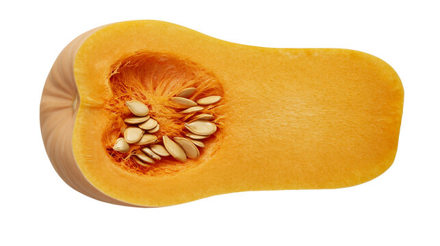 Butternut squash half with seeds and stringy pulp