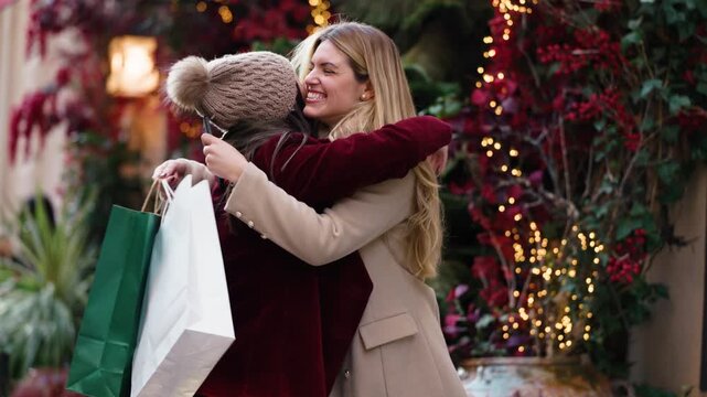 Video of one friend shows the other what she has bought while they walk through the city streets in winter.