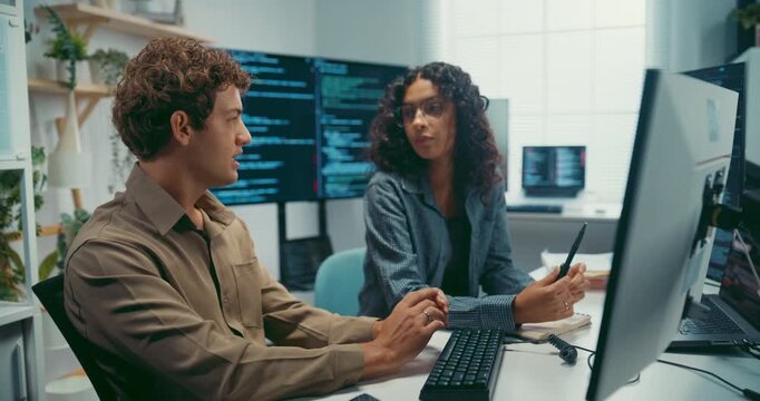 Diverse team software developer discuss AI coding and project strategy at office. Creative startup group brainstorming, Mentor code review training, Digital communication innovation strategy concept.