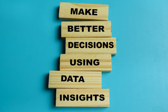 Concept of make better decisions using data insights text on wooden blocks.