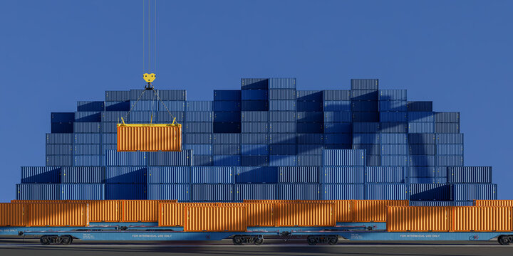 Side view of freight train carrying containers past shipping terminal
