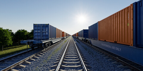 Low angle view between two container trains on tracks at sunset © Taras Rudenko
