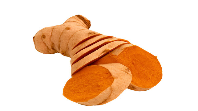 Sliced fresh turmeric root with vibrant orange interior