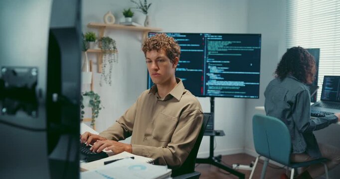 Group Adult male, female freelance typing write prompt AI bot IT app smart program nomad, video game, terminal with coding language, user interface, designer, big data center on desktop computer.
