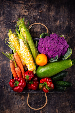 Corn, pepper, cauliflower, carrot, cucumber, tomato and zucchini