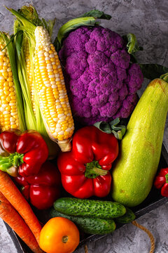 Corn, pepper, cauliflower, carrot, cucumber, tomato and zucchini