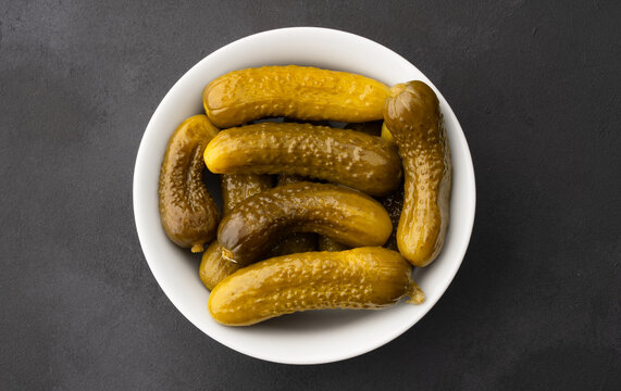 Fresh Homemade Crunchy Gherkin Pickles on Black  Background , Close Up Food Photography