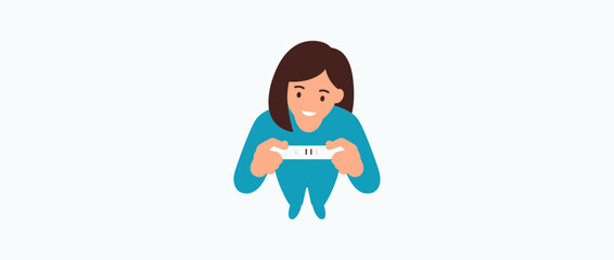 Woman checking positive pregnancy test result