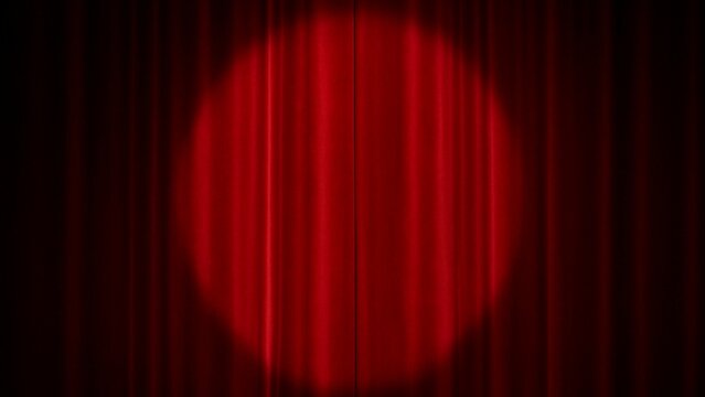Dramatic red theater curtain backdrop with a bright centered spotlight and velvet texture
