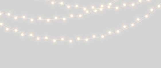 Obraz premium PNG Christmas lights with glowing bulbs for holiday cards and banners overlay background