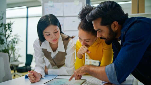 Collaboration and analysis by business people working in office.Planning,innovation,vision,business marketing strategy.Group,team discussing with sticky notes a schedule for future project together