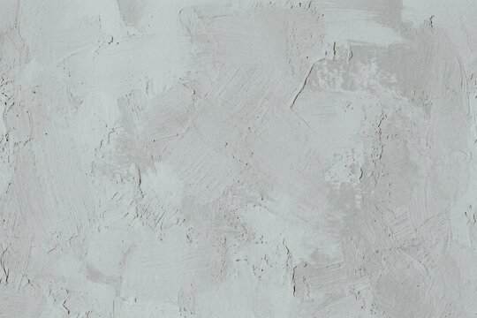 Gray concrete wall texture with brush strokes