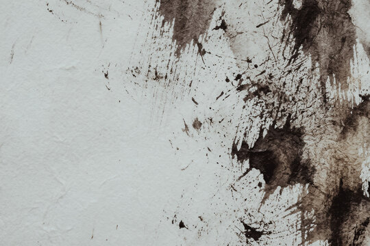 Black ink wash texture on white paper