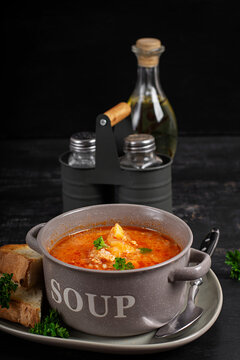 Homemade cabbage soup with minced meat and rustic bread. Czechoslovakian soup.