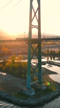 Aerial view of Lions Gate Bridge, Vancouver harbour and West Vancouver at dawn