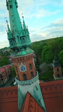Agile flight around St. Joseph's Church and over Podgorski Square in Cracow