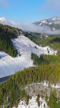 Aerial view on Canadian rocky mountain landscape covered in snow