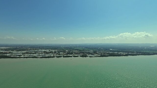 Aerial View Of Coastline And Land From The Sea footage