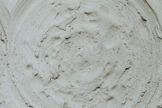 Circular plaster texture with swirl pattern