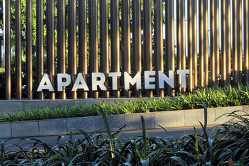 Obraz premium Apartment Sign At Modern Building Entrance 