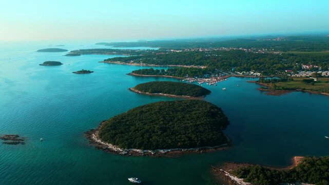 Cinematic drone flight above the coastline near of Vrsar town, Adriatic coastline